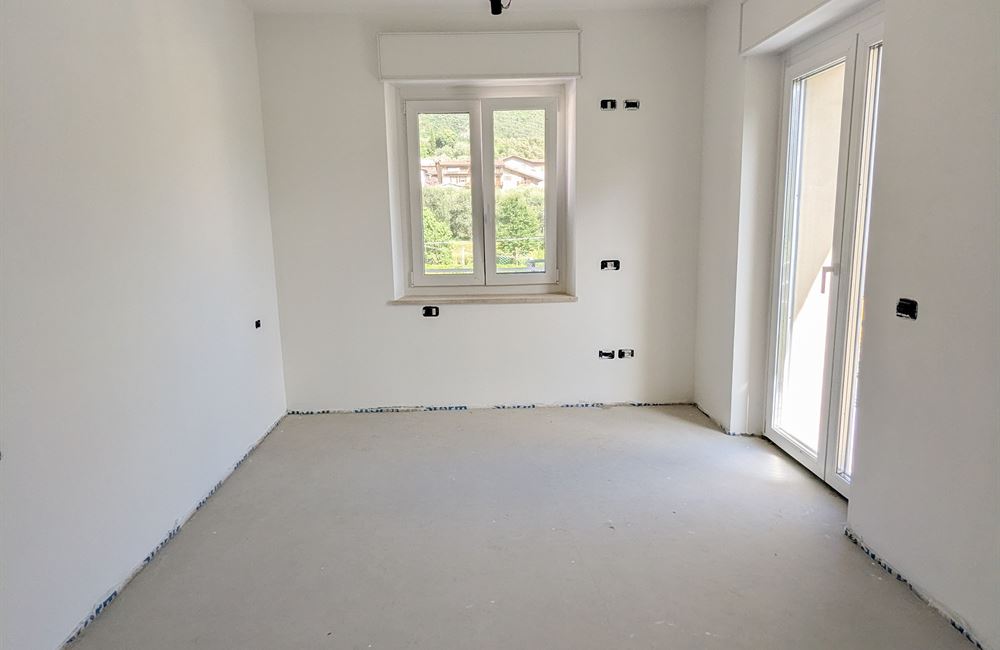 APPARTAMENTO QUADRILOCALE AD ARCO CON BALCONI, GARAGE E CANTINE - Vendita Appartamento quadrilocale Arco Lago di Garda